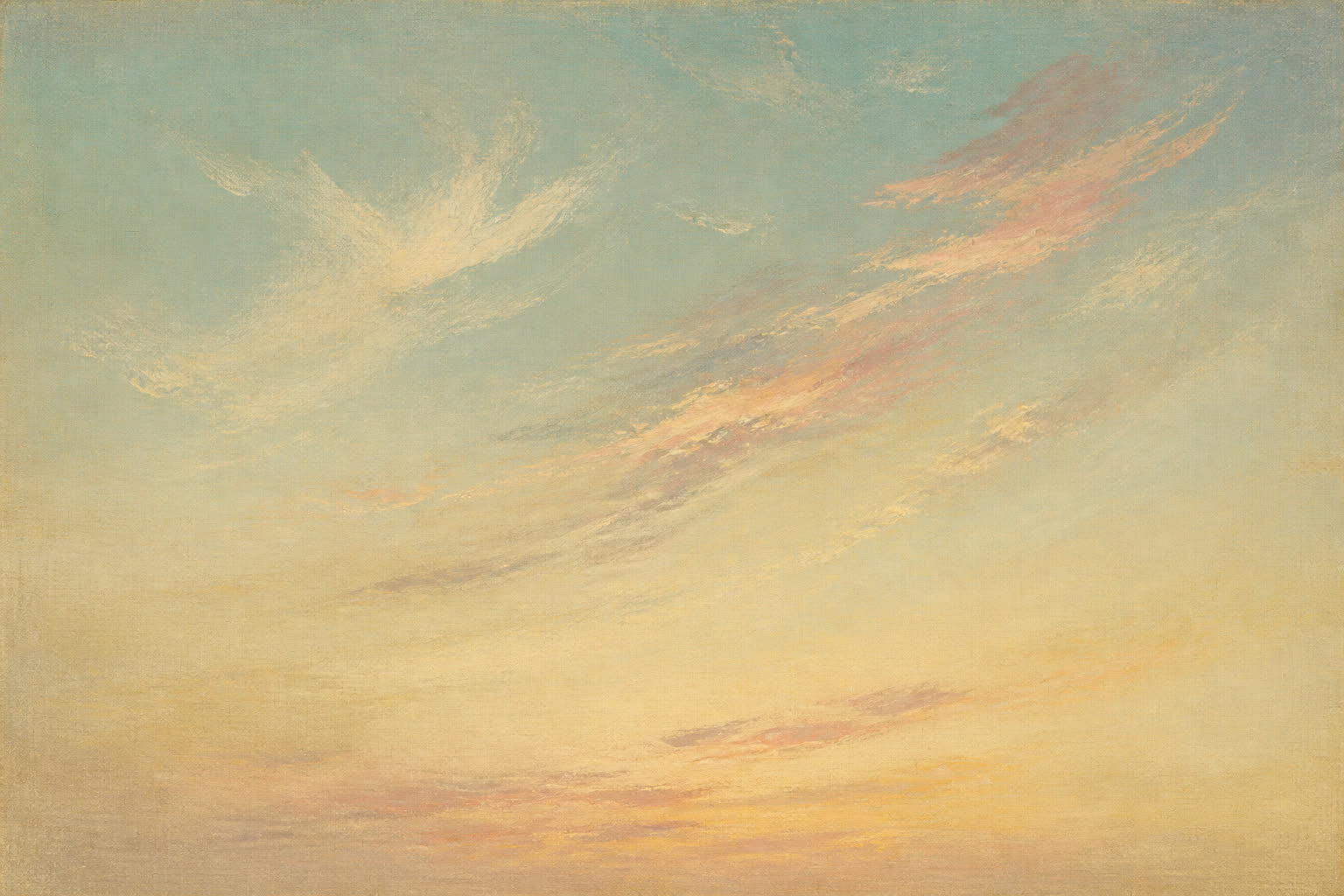 Fine cirrus clouds crossing a soft dusk sky